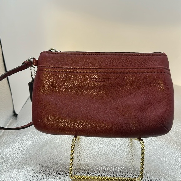 Coach wristlet deep, red color. An excellent condition. 5 1/2 x 8.​​ - Picture 1 of 7
